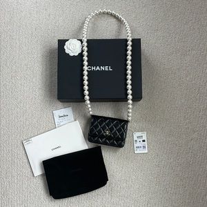 Chanel Pearl chain flap bag 21K